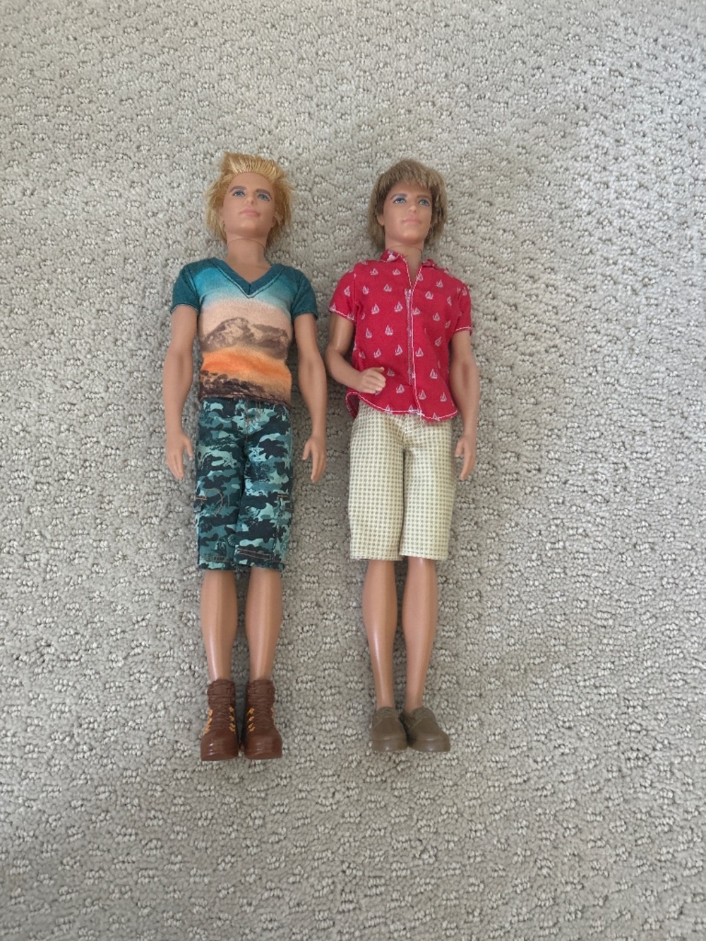2 ‘Ken’ Barbie dolls